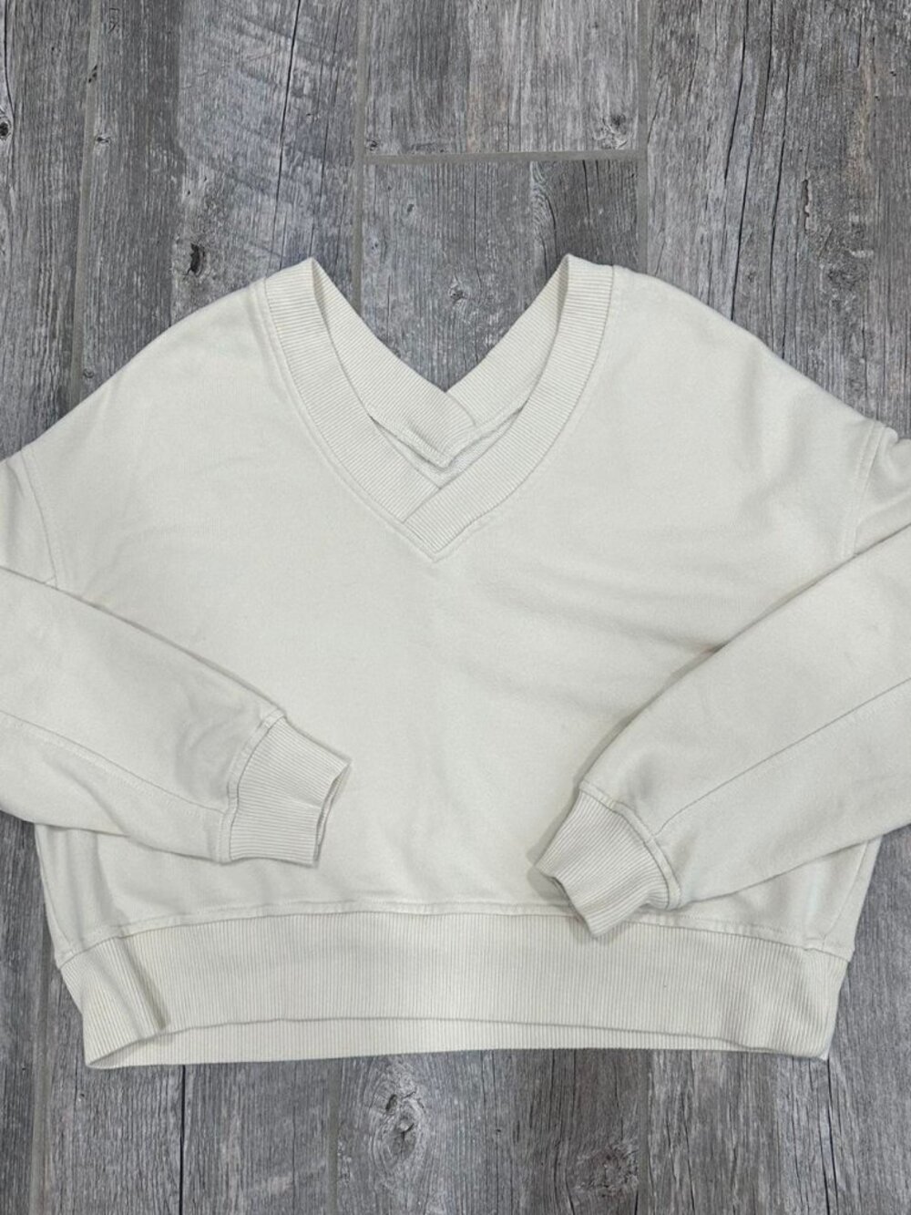 Cream Cropped V-Neck Sweatshirt